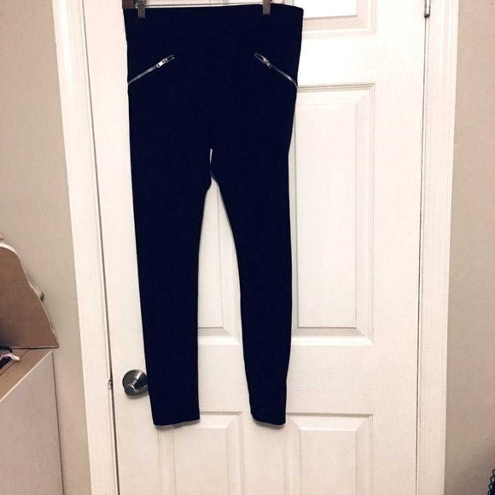 Black skinny stretch pants with zippers